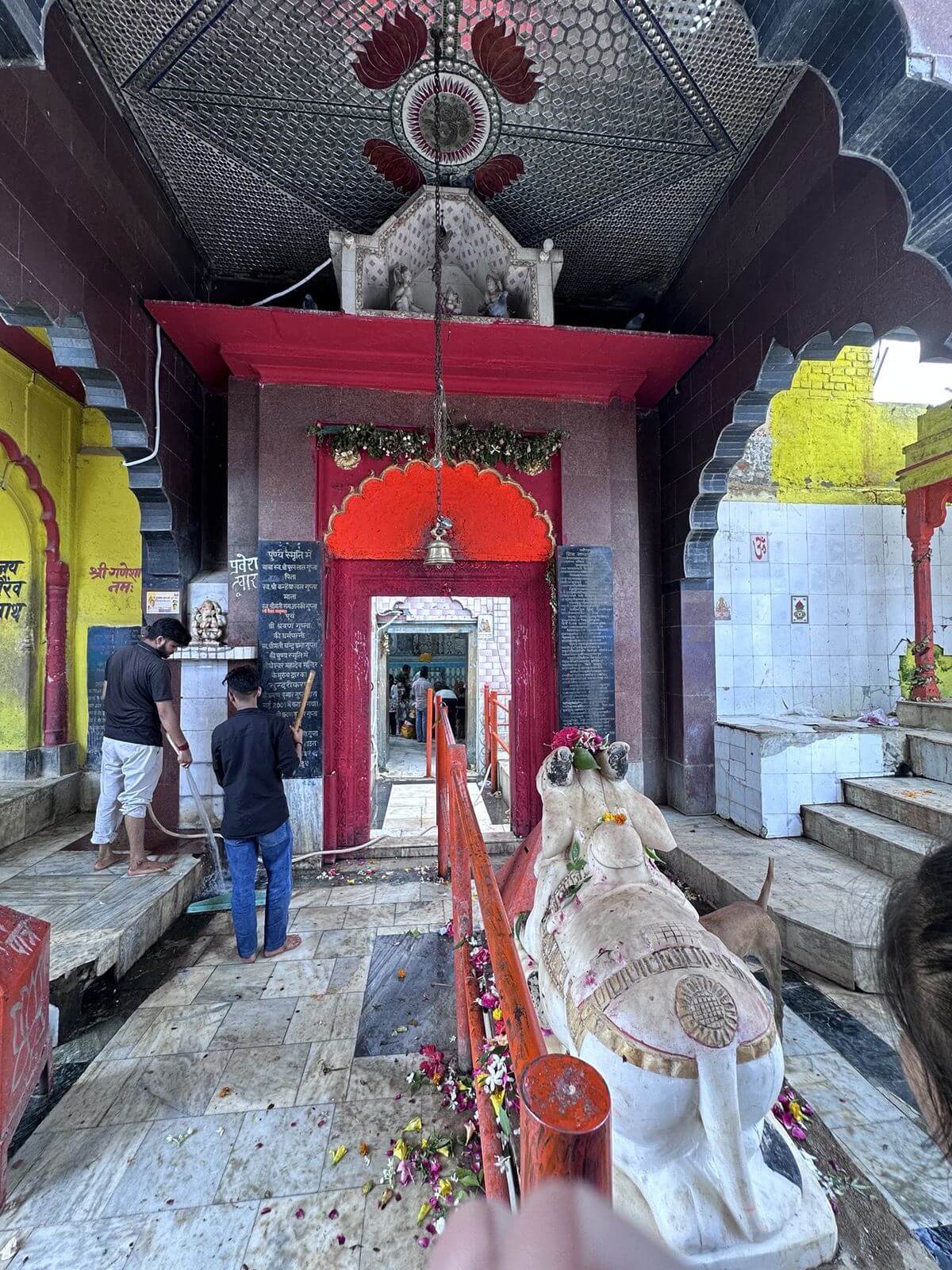 Main temple entry with opened kapat doors