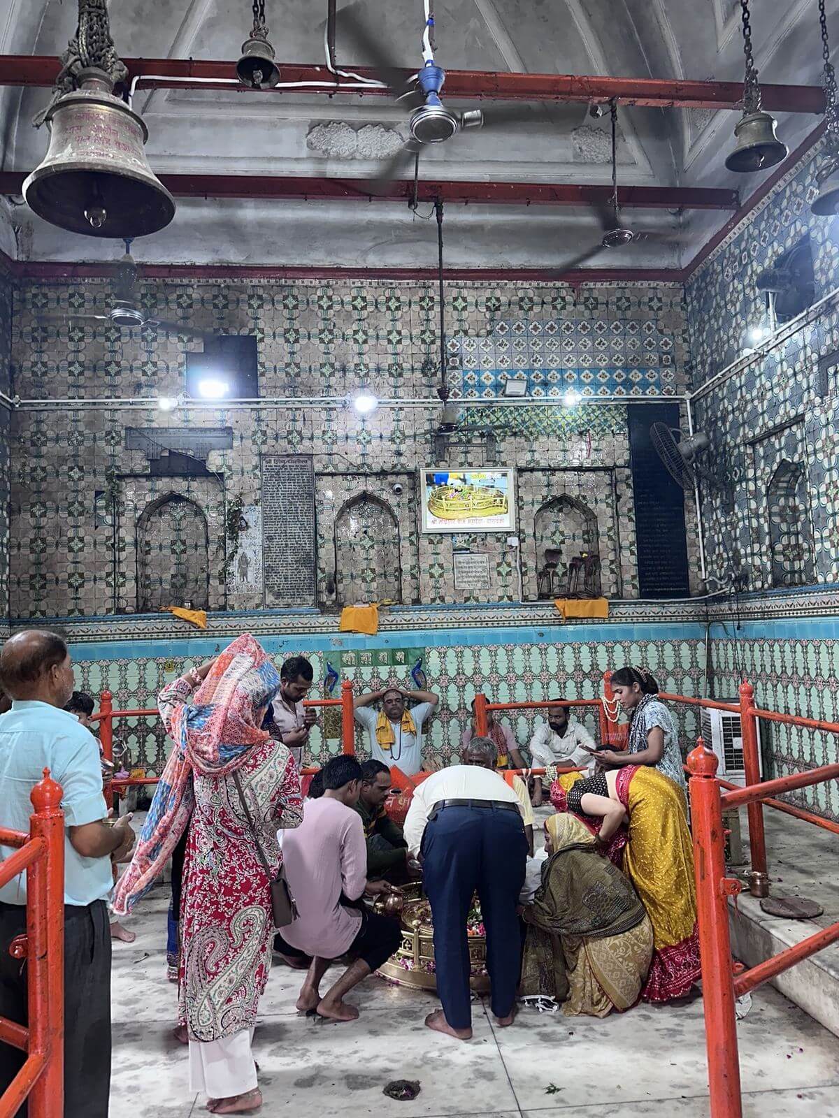 Devotees gathered inside the tiled inner sanctum